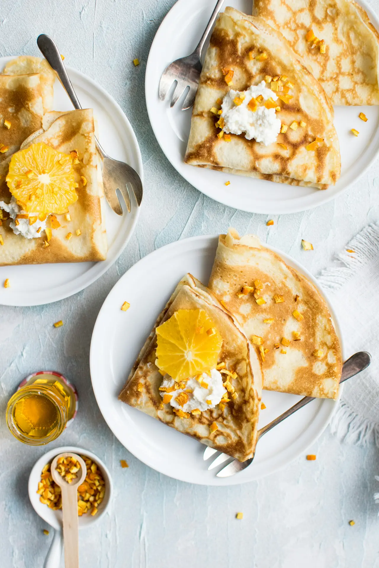 Crêpes au beurre d'orange pliées en quatre